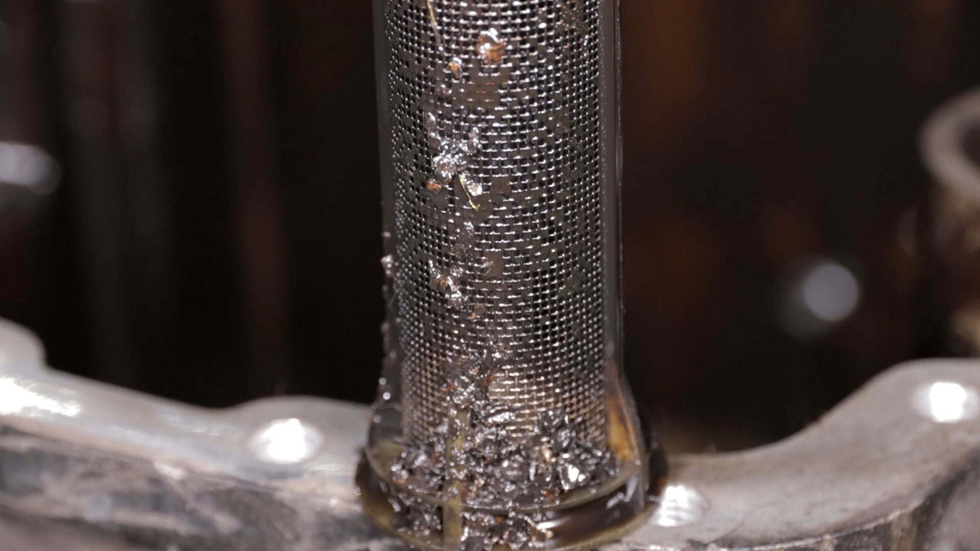 Сетчатый фильтр в КПП после износа поддельного масла